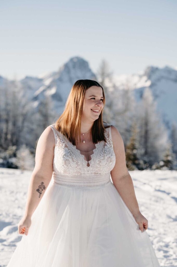 Hochzeitsfotos im Schnee am Berg